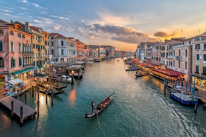 Features - "Italy, Venice, Elevated view of canal in city"